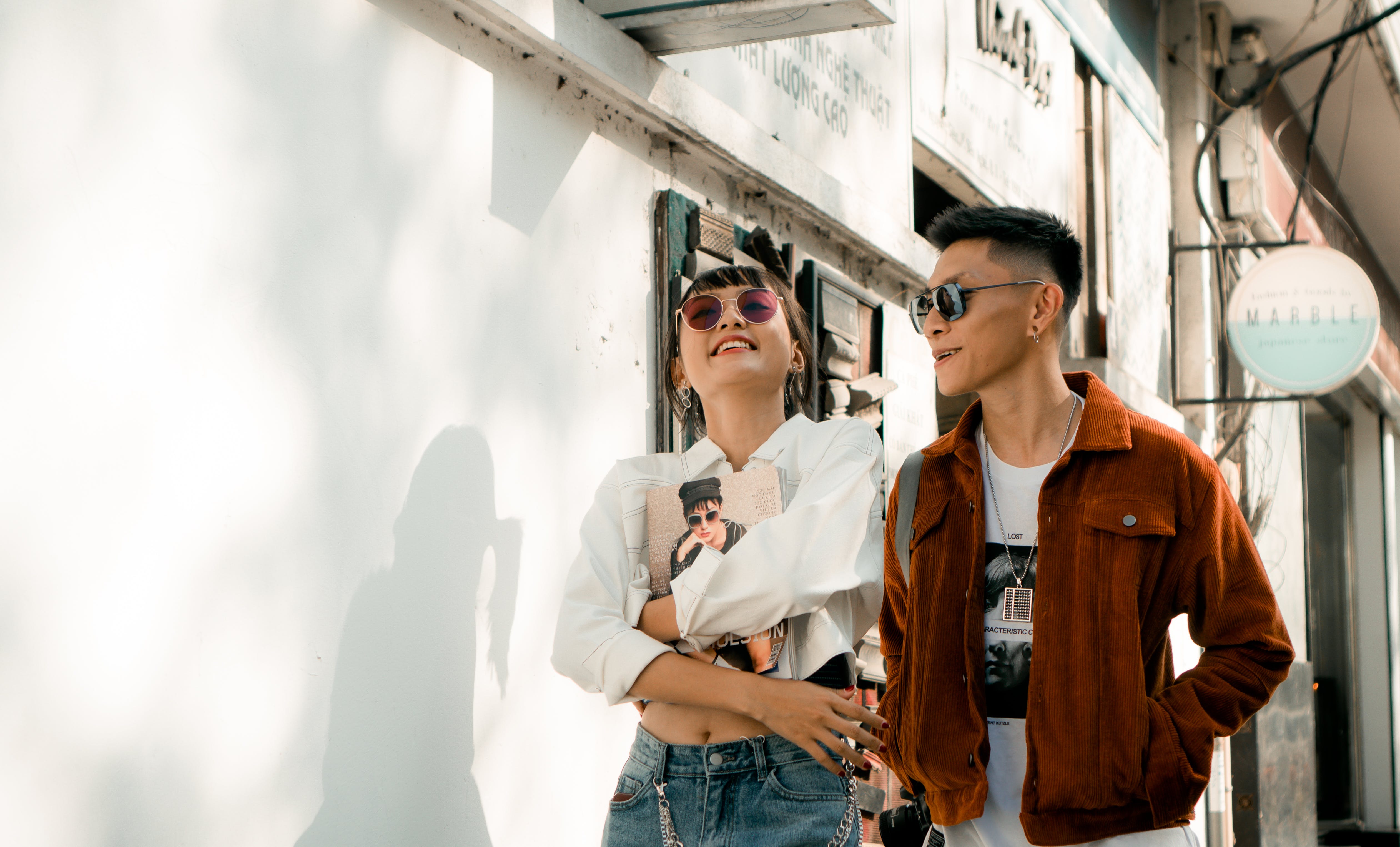 two models on a balcony